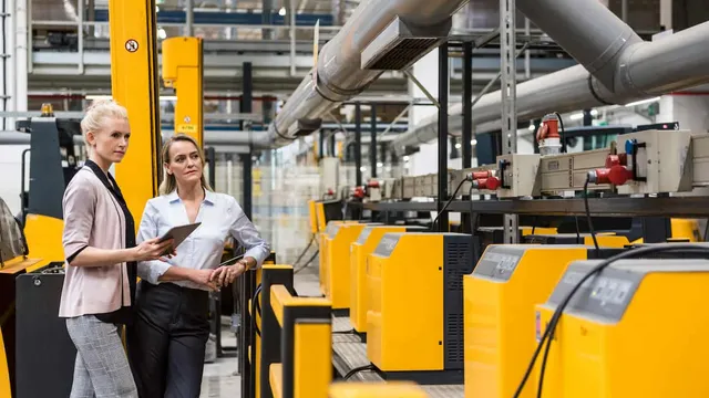 Women checking lean manufacturing process.